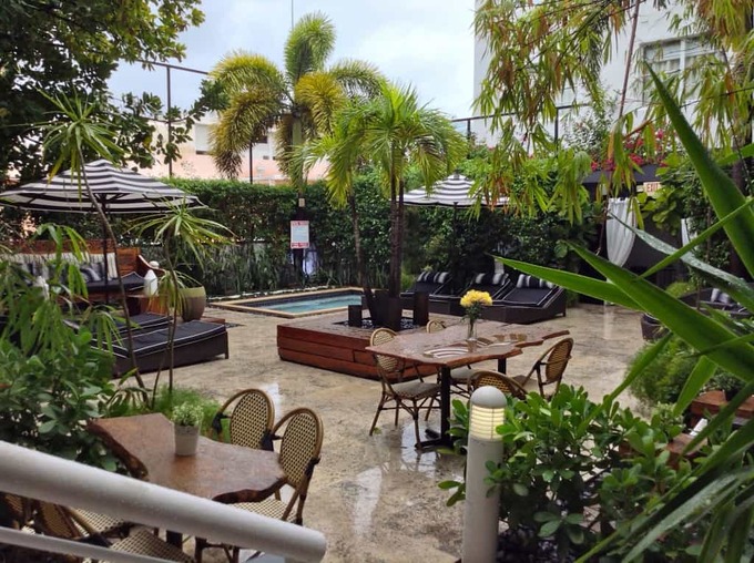 The cozy courtyard at the Metropole Hotel is a great place to enjoy a drink.