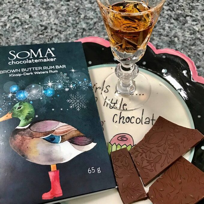 Soma Chocolatemaker Brown Butter Rum Bar pairs well with a glass of Angostura rum