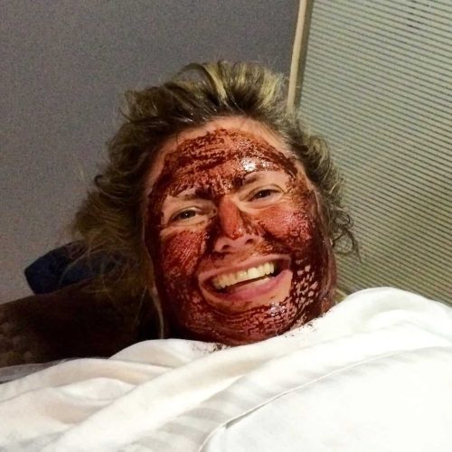 Doreen enjoying a chocolate body wrap and facial during the Grenada Chocolate Festival.