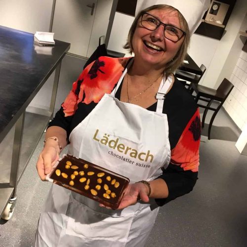 Doreen making a chocolate bar in Switzerland.